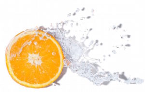 Vitamin C, symbol, orange slice through water